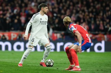 Real Madrid 'den Federico Valverde, UEFA Şampiyonlar Ligi maçında Atletico de Madrid ve Real Madrid 12 Mart 2025 tarihinde Madrid' de Metropolitano Stadyumu 'nda oynadı.