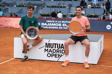 İspanya 'dan Marcel Granollers ve İspanya' nın Madrid kenti La Caja Magica 'da düzenlenen Mutua Madrid Açık' ın 12. gününde oynanan Erkekler İkili Final Maçında Horacio Zeballos.