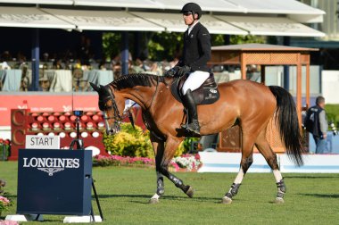  Longines Global Şampiyonlar Turu sırasında Madrid Club de Campo Villa de Madrid 'de 18 Mayıs 2025' te Madrid, İspanya 'da yarışan sürücü.