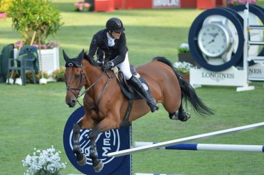  Longines Global Şampiyonlar Turu sırasında Madrid Club de Campo Villa de Madrid 'de 18 Mayıs 2025' te Madrid, İspanya 'da yarışan sürücü.