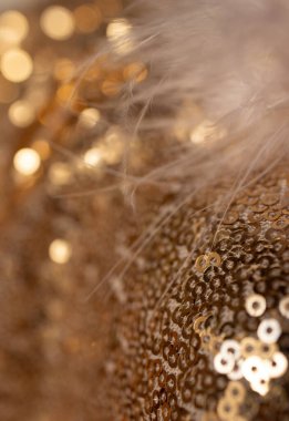 Lüks ürün arka planı. Altın parıltılı kumaş arkaplan materyali..