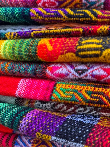 stock image Aboriginal weavings in Tilcara,Salta.nternational tourism in Salta, Argentina.Craft markets in the streets.Textures woven on looms, colourful aboriginal weavings in Salta. Day of the Aborigines