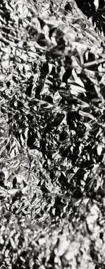 Endüstriyel desenli metalik gümüş yüzey. Grafiksel Tasarım için desenli metal levha. Arkaplan için Yüksek Çözünürlüklü Fırçalı Metal Yüzey