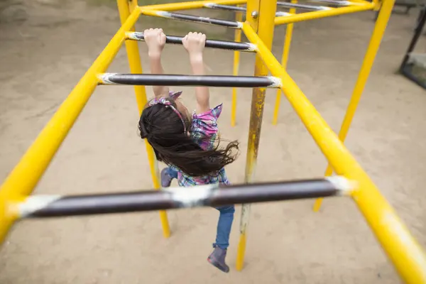 stock image cute little asian  girl playing on playground  in the park