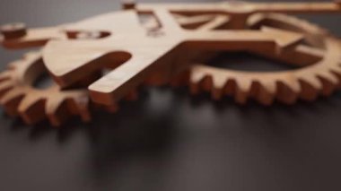 Ahşap dişlilerden yapılmış mekanik bir yapının animasyonu. Döngüsel hareket. Yakın plan. Yatay bileşim. Odaklanmayın.