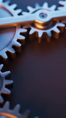 Metal dişlilerden yapılmış mekanik bir yapının animasyonu. Döngüsel hareket. Yakın plan. Dikey kompozisyon. Odaklanmayın.