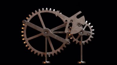 Metal dişlilerden yapılmış mekanik bir yapının animasyonu. Alfa Kanalı. Döngüsel hareket. Yatay bileşim.