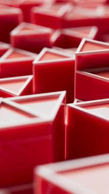 Parlak kırmızı üç boyutlu üçgenlerin geometrik desende hareket eden döngülü animasyonu. Modern, soyut ve dinamik bir arkaplan. Teknoloji, hareket ya da tasarım temaları için mükemmel.