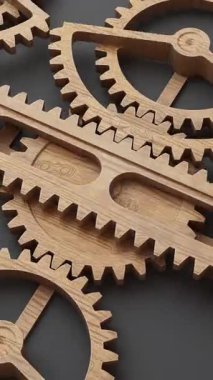 Birbirine kenetlenmiş ahşap dişliler ve askılardan oluşan aralıksız üç boyutlu animasyon döngüsü, işlev, biçim ve doğal ahşap güzelliği harmanlayarak ince detayları, hassasiyeti ve işçiliği vurguluyor..