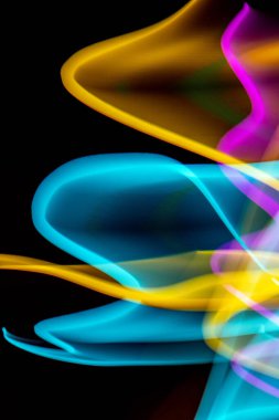 A Neon Wavy Light Nightclub Background Swirls on Black Background