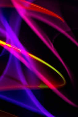 A Neon Wavy Light Nightclub Background Swirls on Black Background