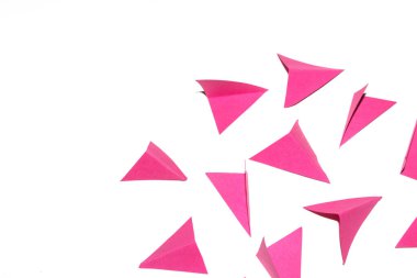 A Pink and White Geometric Folded Paper Triangle Shapes for Background Craft