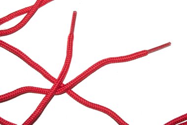 A Close Up of Red Shoe Lace Fabric on a White Background