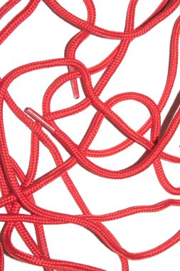 A Close Up of Red Shoe Lace Fabric on a White Background