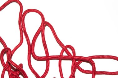 A Close Up of Red Shoe Lace Fabric on a White Background
