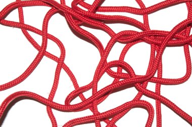 A Close Up of Red Shoe Lace Fabric on a White Background