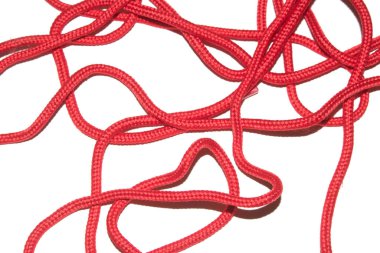 A Close Up of Red Shoe Lace Fabric on a White Background