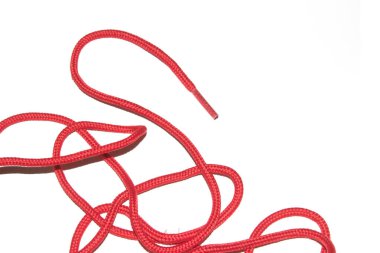 A Close Up of Red Shoe Lace Fabric on a White Background