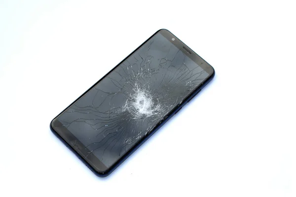 Smartphone Phone being Smashed By a Hammer the Glass is Shattered