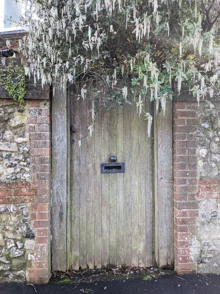 A Antique Historic Secret Door in a Stone Wall