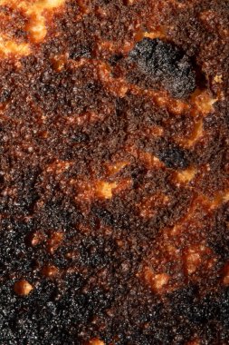 Çok yanmış bir ekmek rulosu Yakın çekim dokusu