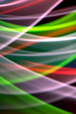 Siyah Arkaplanda Neon Gökkuşağı Işığı Soyut Çizgiler Girdap ve Dalgalar