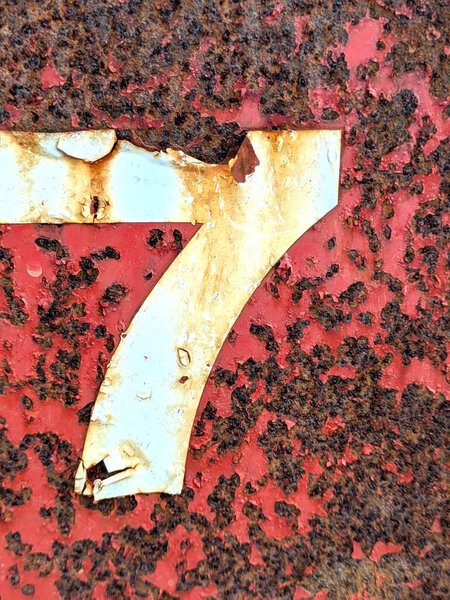 Written Wording in Distressed State Typography Found Number seven, 7