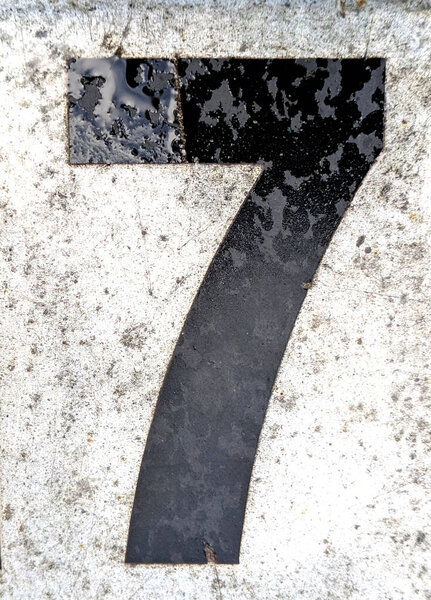 Written Wording in Distressed State Typography Found Ransom Number 7 Seven