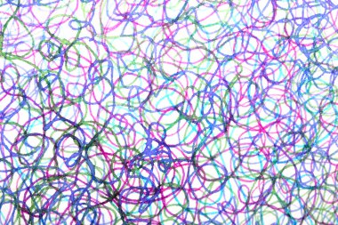 Coloured ink pen scribbled wavy messy tengled lines on white background