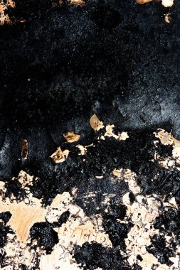 Mutfak sosu kabataslak arkaplanındaki ağır siyah pas tabakasını kapatın.