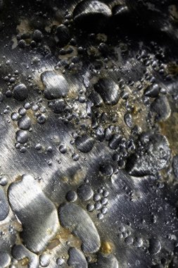 Kaynayan yağlara ve yağlı ızgara soyut yiyeceklere yakın durun.