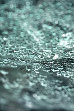 Dantel çizgilerdeki soyut su damlacıkları yumuşak ve güzel arkaplanı doldurur