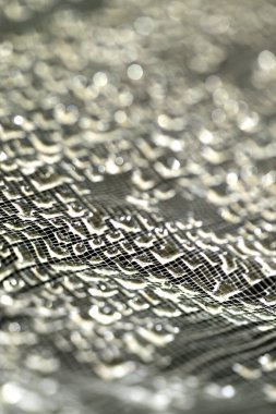 Dantel çizgilerdeki soyut su damlacıkları yumuşak ve güzel arkaplanı doldurur