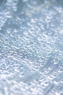 Dantel çizgilerdeki soyut su damlacıkları yumuşak ve güzel arkaplanı doldurur