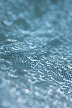 Dantel çizgilerdeki soyut su damlacıkları yumuşak ve güzel arkaplanı doldurur