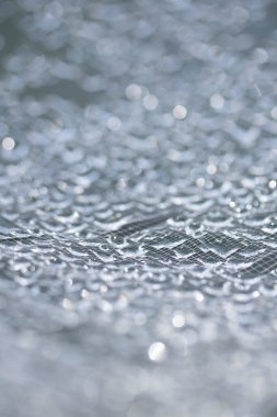 Dantel çizgilerdeki soyut su damlacıkları yumuşak ve güzel arkaplanı doldurur