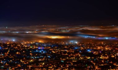 Sis Altında Şehrin Işıkları