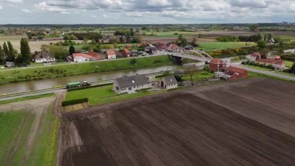 Agricultural Machinery Tills Fertilizes Fields River Aerial View — Αρχείο Βίντεο