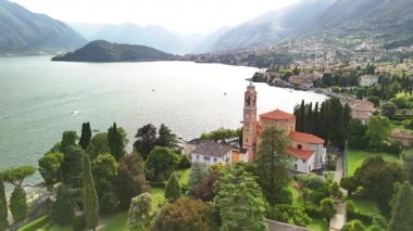 Como Gölü 'nün nefes kesici güzelliğini canlı ağaçları, dingin suları ve büyüleyici tarihi binalarıyla tecrübe edin. Hava perspektifi bu İtalyan hazinesinin büyüleyici manzarasını gözler önüne seriyor..