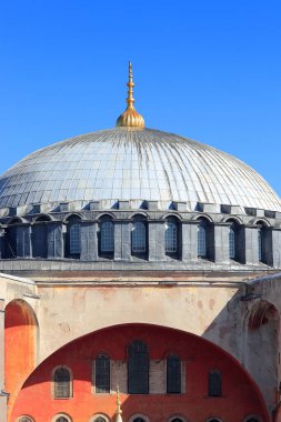 Tile Roof, and Arched Windows Against Blue Sky. blue mosque aya sophia, Istambul Mosque, Turki Mosque, Turki, February,13,2020 clipart