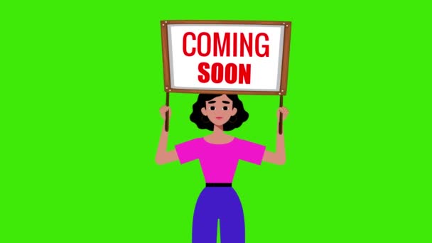 Dziewczyna Gospodarstwa Coming Soon Signboard Wychodzi Zielonym Tle Animacja Kobieta — Wideo stockowe