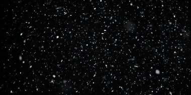 Harmanlama modu için siyah arkaplan üzerine odaktan düşen kar taneleri. Kar, kar, siyah üzerine kar, seçici odak