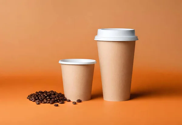 Paper coffee cup mockup for logo and design with gray background, v32