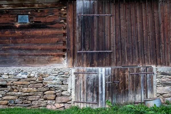 Old barn made of wood and stone in Albac-Romania