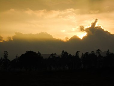 Beautiful rays of the sun on a sunset from Bosa, in Bogota - Colombia clipart