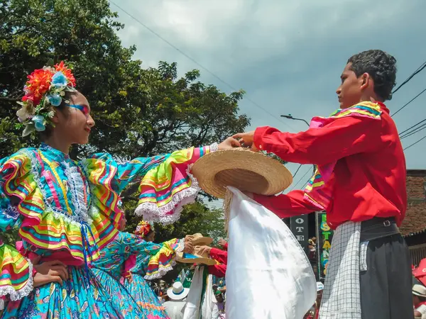 stock image Neiva, Huila, Colombia - June 30, 2024 - Latin couple practicing a traditional Huila dance during the San Juan and San Pedro Festival parade