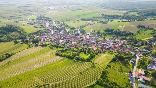Vineyards and agricultural fields around Falkenstein village in Austria seen from the air