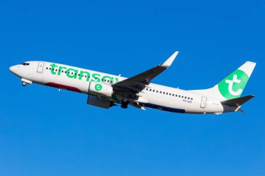 Salzburg, Austria - January 27, 2024: Beautiful departure of a Transavia Boeing 737 aeroplane in front of blue sky clipart