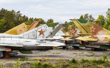 Riga, Latvia - June 1, 2023: Retired MIG-21 military fighter jets of the Russian Air Force clipart