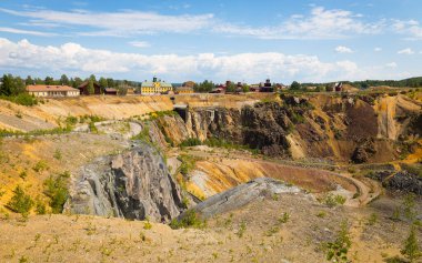 Closed open pit copper mine and tourist attraction in Falun, Sweden clipart